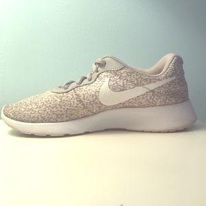Nike white zebra print running shoes